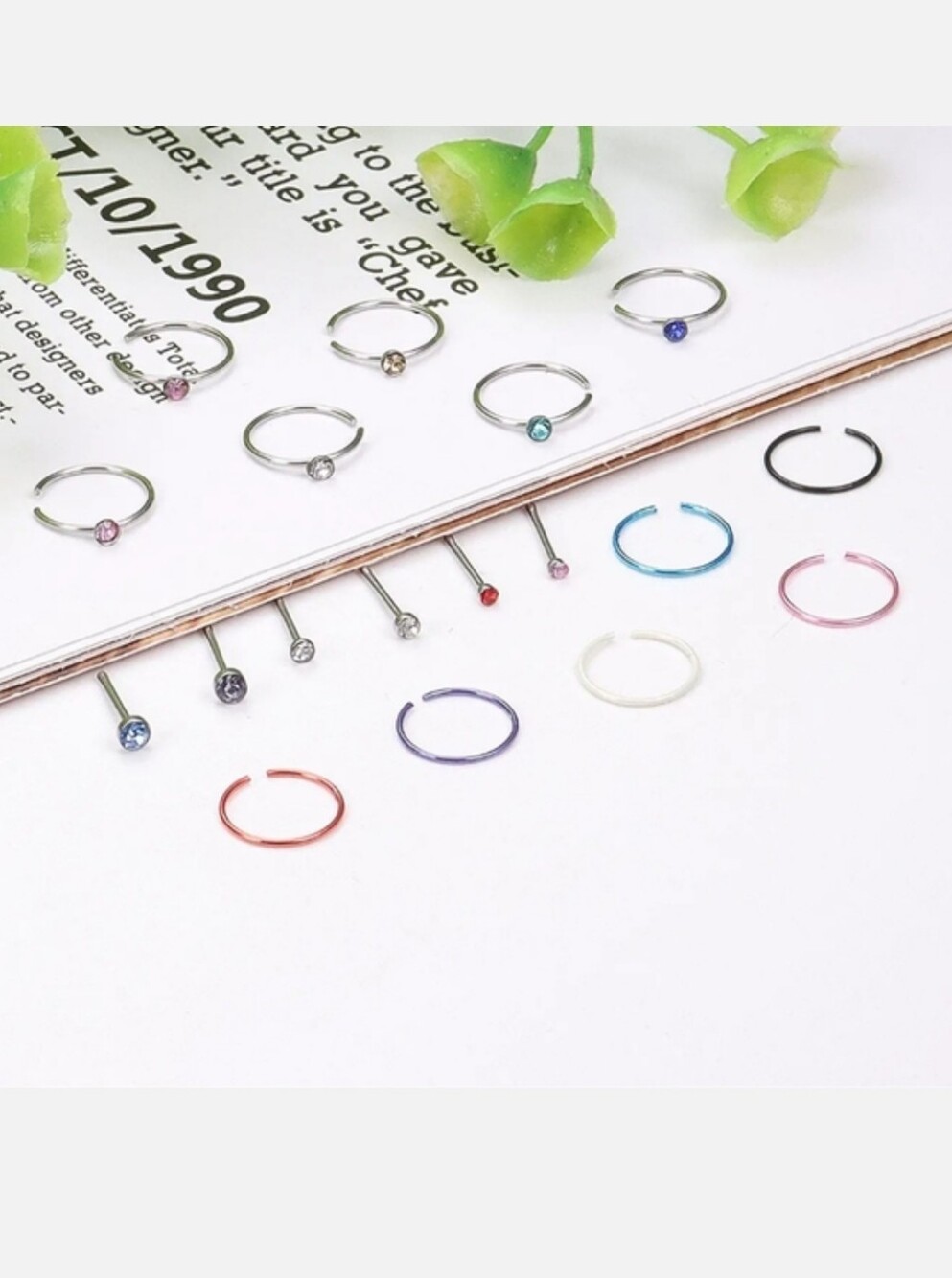 18 nose rings💙💜💚😨